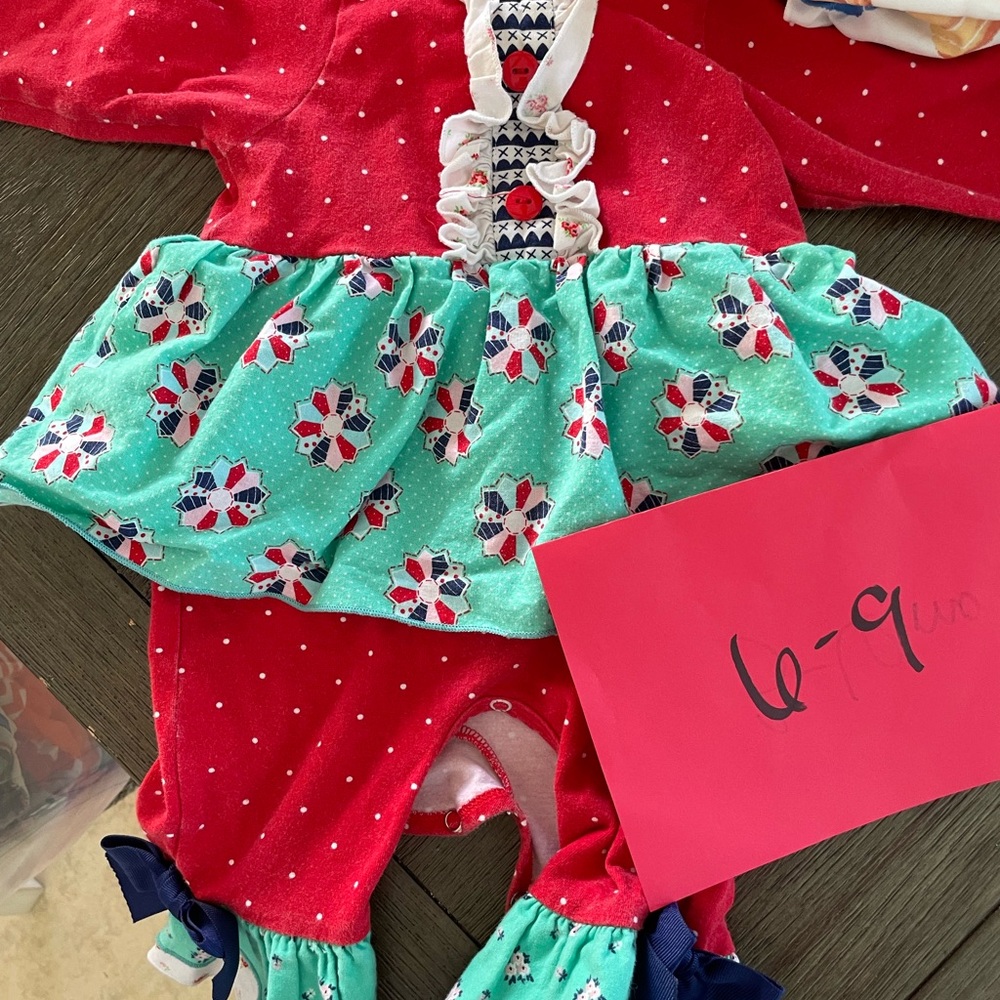 Red and Green Ric Rac and Ruffles Baby Outfit with Floral Design
